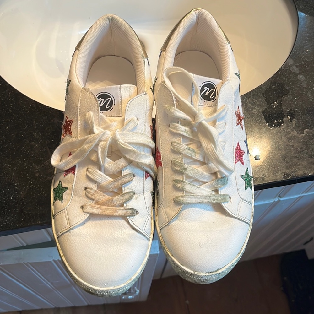 Coconuts brand white sneaker with multicolored stars